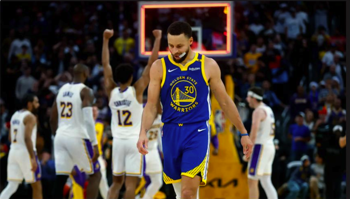 Steph Curry walks off court after his 40-point performance on Christmas is spoiled by the Los Angeles Lakers