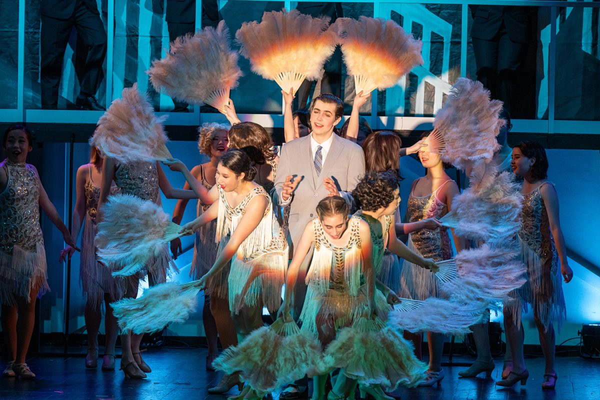 Jasper, as Billy Flynn, takes the spotlight in his solo number that also serves as his introduction, "All I Care About Is Love."