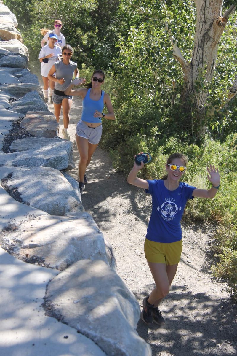 Putting in the Work;The girls team embarks on their daily run at Mammoth running camp.

