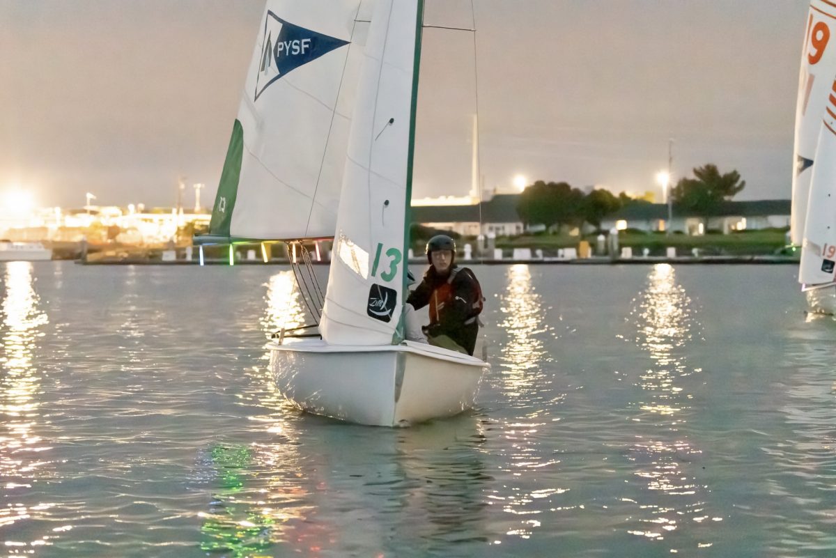 Max K. '26 skippers on a CFJ (Club Flying Junior), the standard boat for interscholastic sailing.
