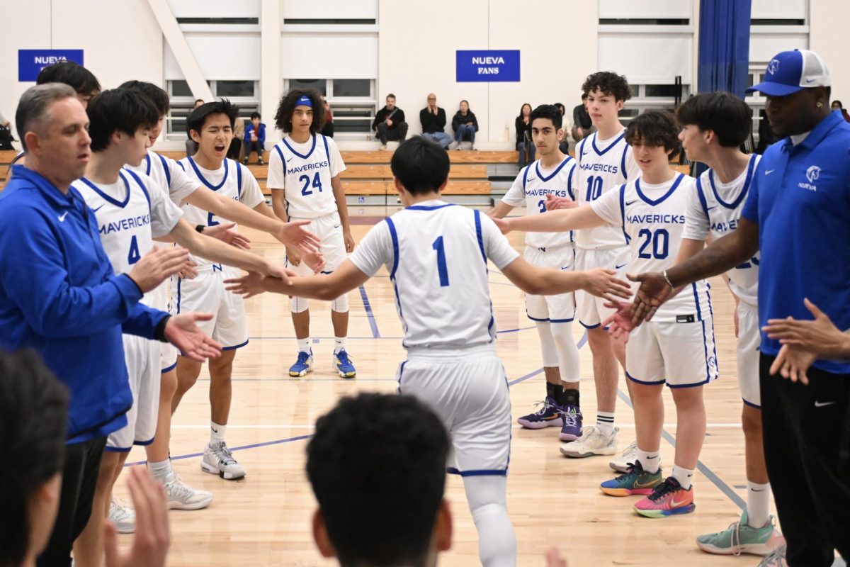 Half Time Trevor C. '28 high-fives his teammates