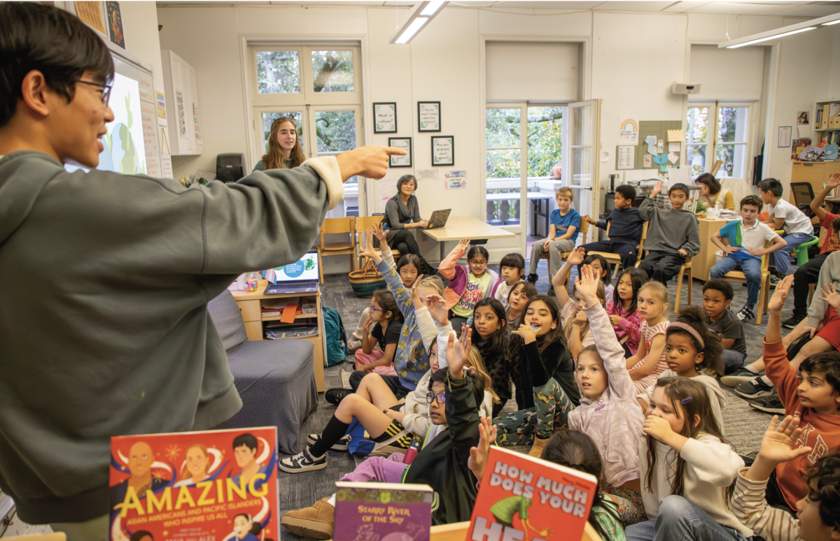 Kyle W. and Lila P. ask Lower School students questions about biodiversity.