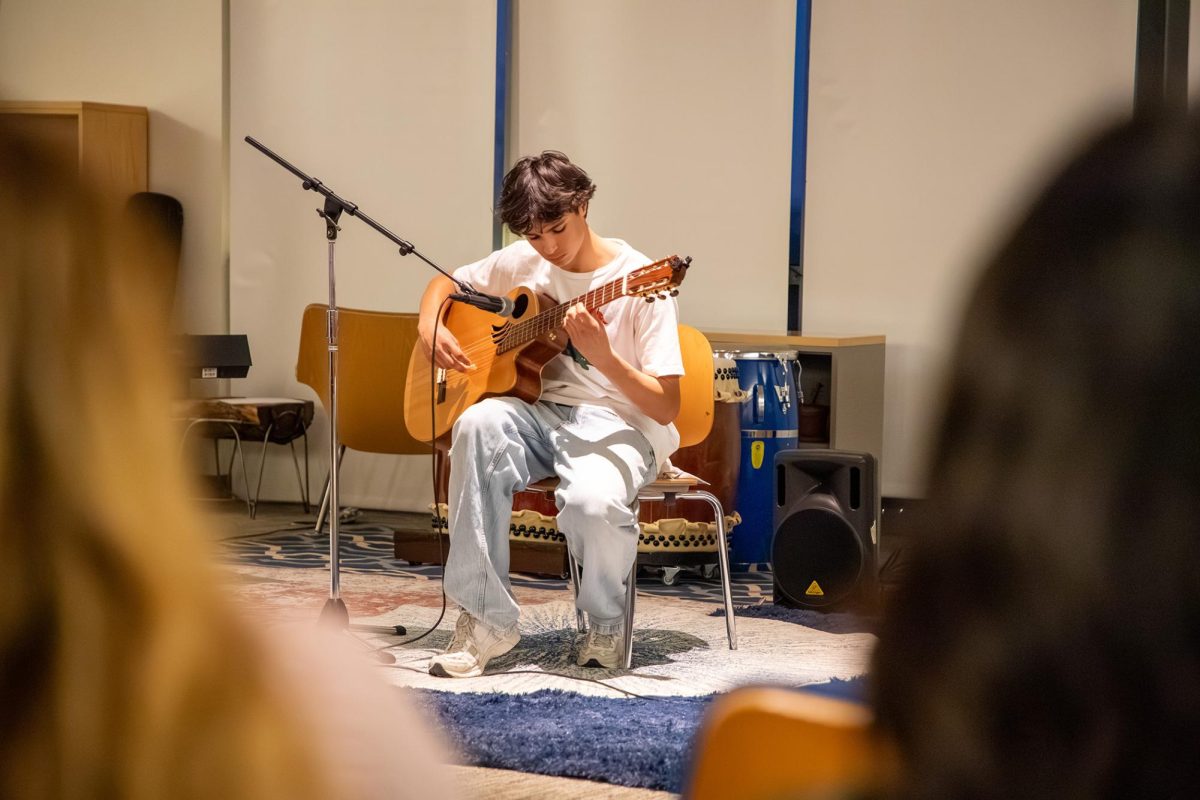 Ishaan B. ’28 performs “Capricho Árabe” on a classical guitar.