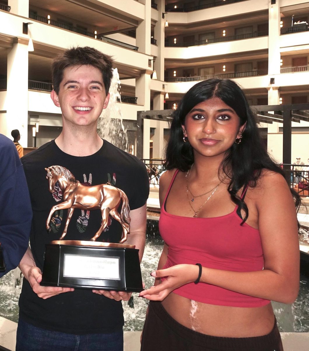 Fear the Kvaal // Oliver A. '26 (left) and Anika G. '26 (right) pose with their TOC trophy. 