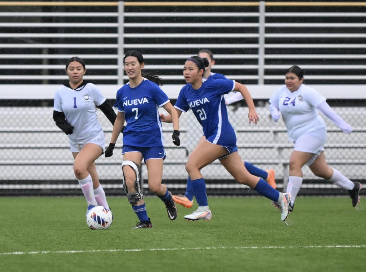 Shooting Their Shots: Juliet Chen '26 and Caroline F. '28 during a home game against Ace Charter. // Photo by Diane Mazzoni